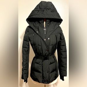 NWOT Michael Kors black belted puffer jacket with hood. Size XS. 18” pit to pit.